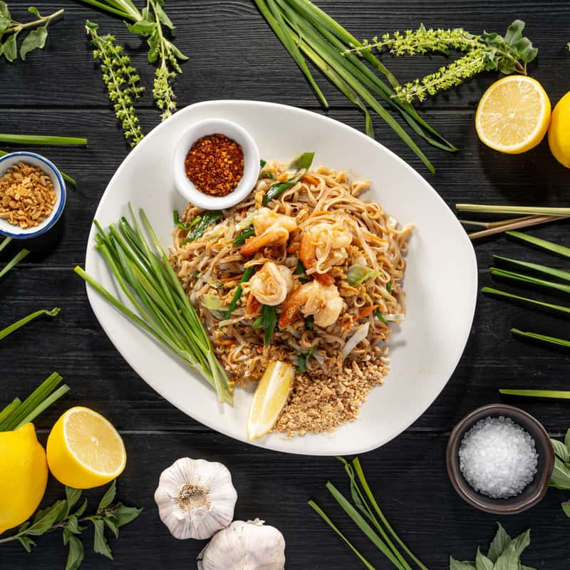 Exquisite Pad Thai with Succulent King Prawns, a Culinary Delight of Thai Cuisine